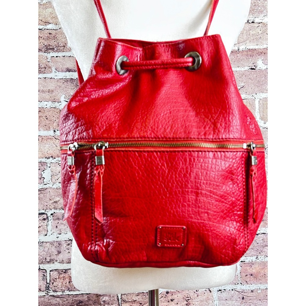 The Sak Red Pebbled Leather Drawstring Backpack Tassel Zip Pocket Boho Chic